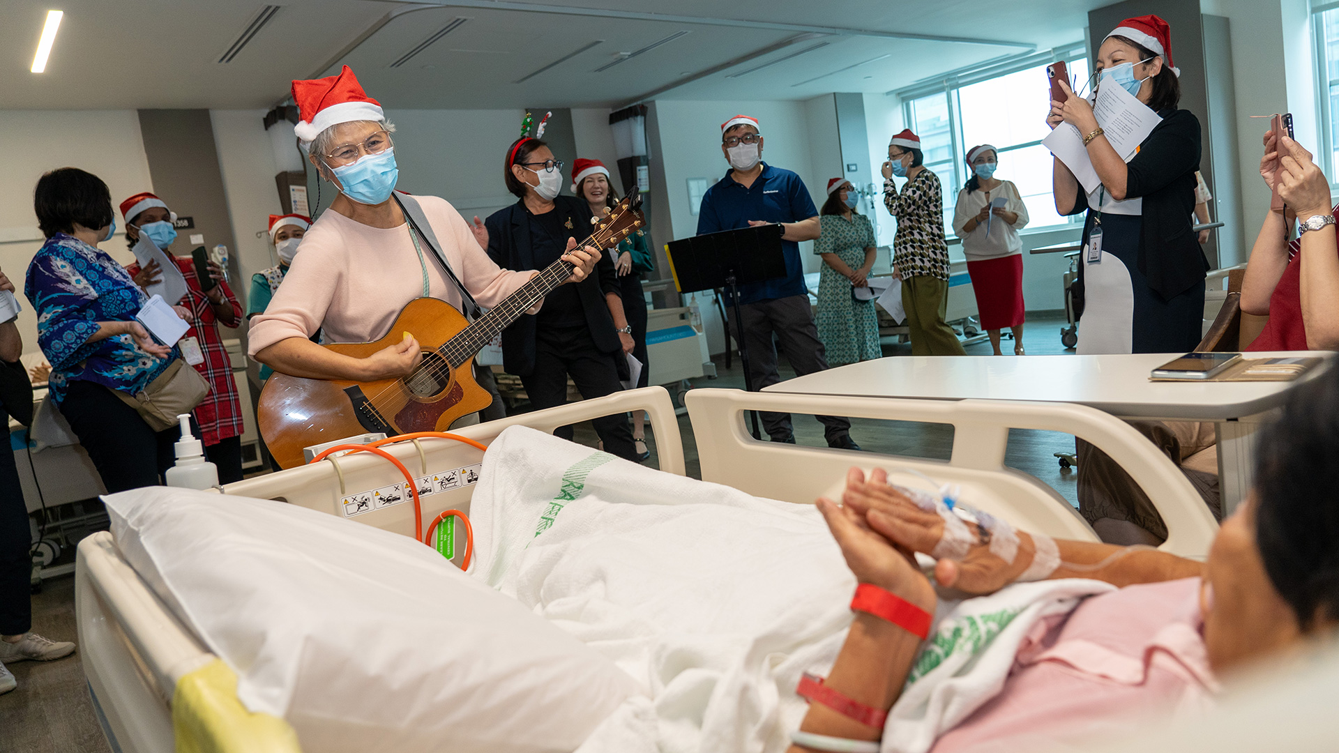 AMF Christmas Carol to Raffles Hospital patients