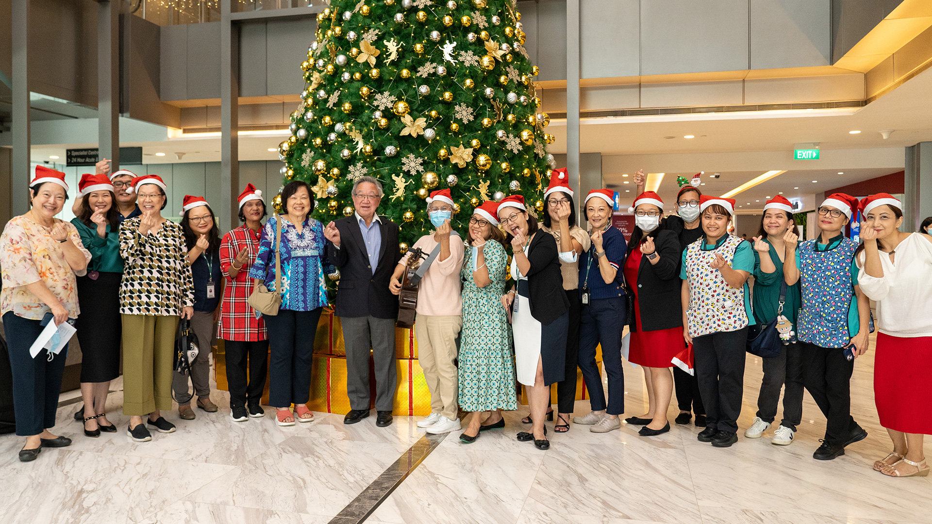 AMF Christmas carol team raffles hospital